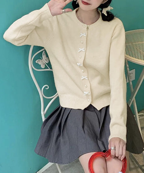 リボンニットカーディガンパールボタン無地 ニットセーターレディース クルーネック デザインニット ガーリーきれいめフェミニン秋服 韓国風 大人可愛いニットトップス 2YIKE-008